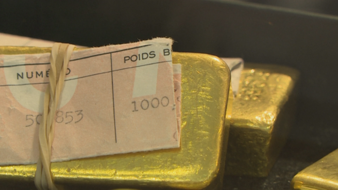 L'or franchit la barre des 5 000 dollars l'once, une première historique